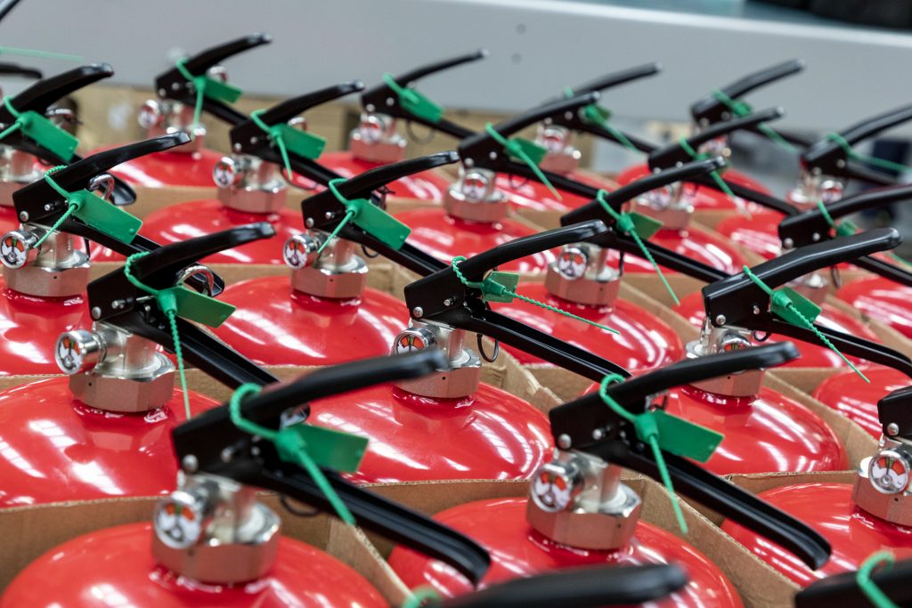how many fire extinguishers should a business have on site